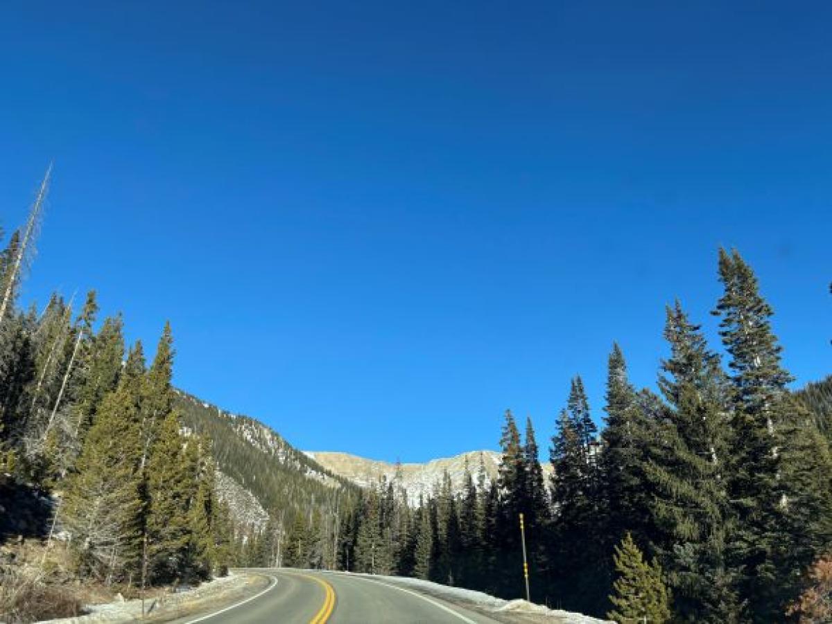 picture of a road in the mountains on a sunny clear day
