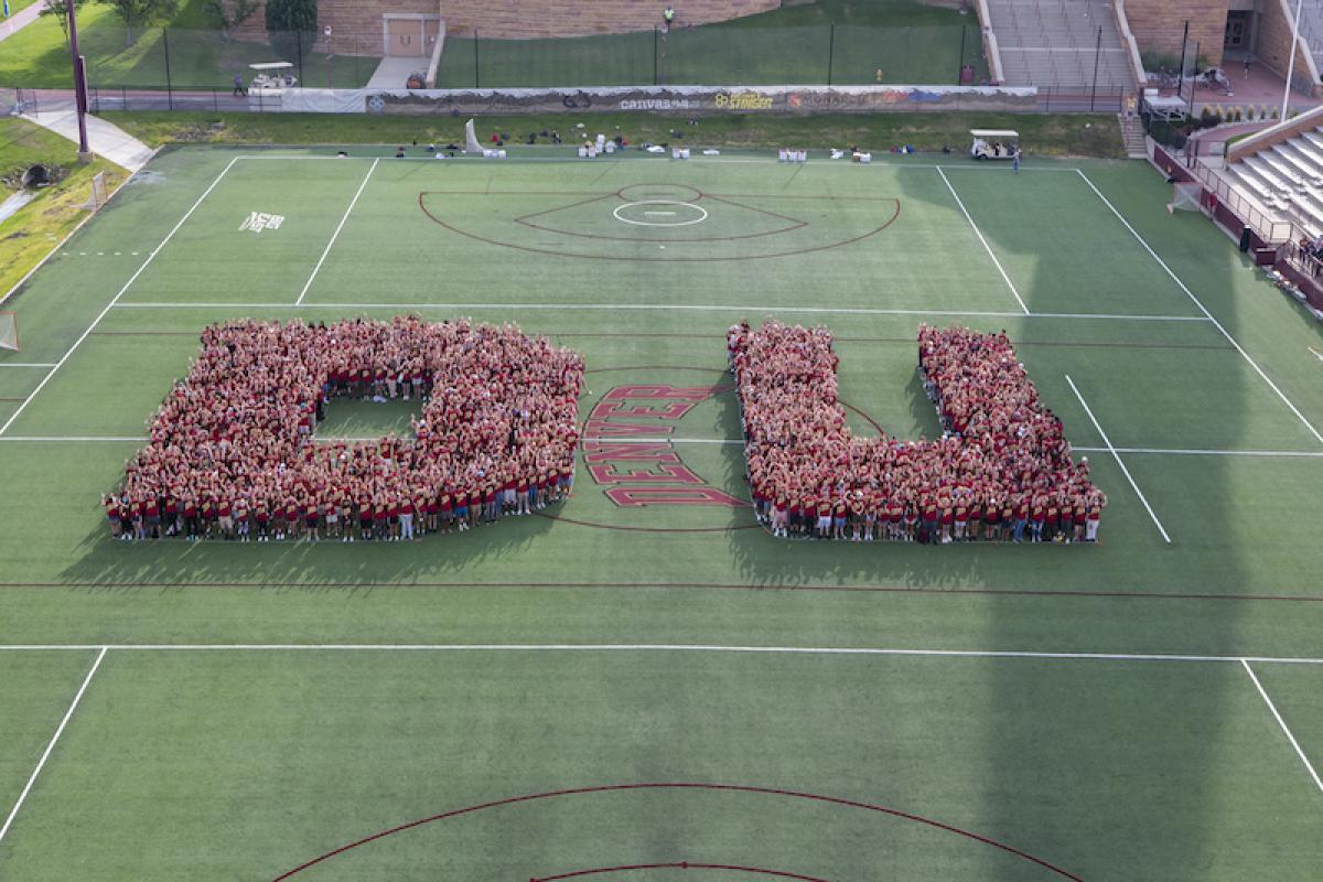 First-year students form DU on the field