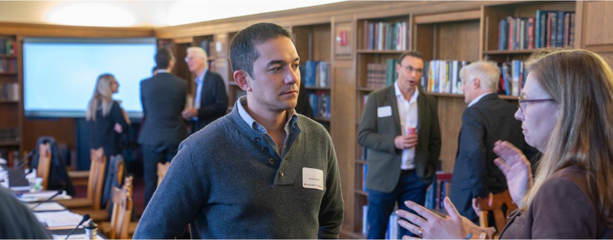 two people talking in a conference