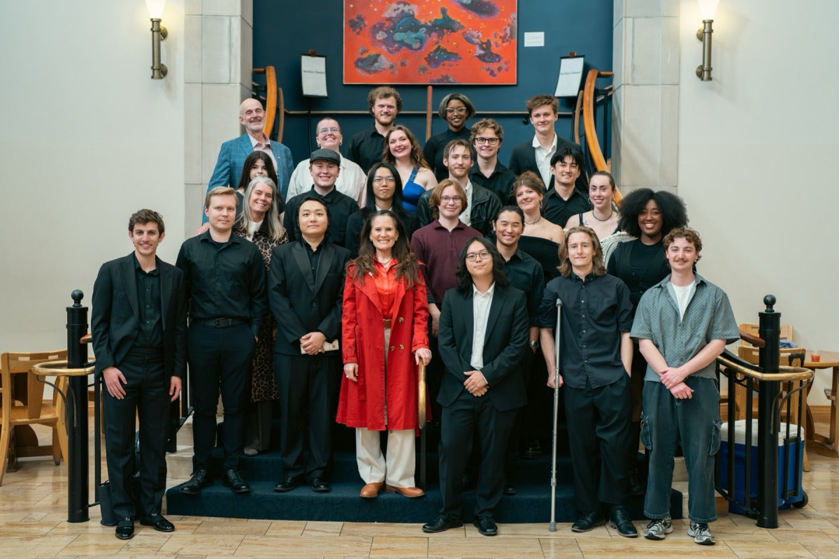 Provost Loboa smiles and stands with the performers of her first Provost Concert.