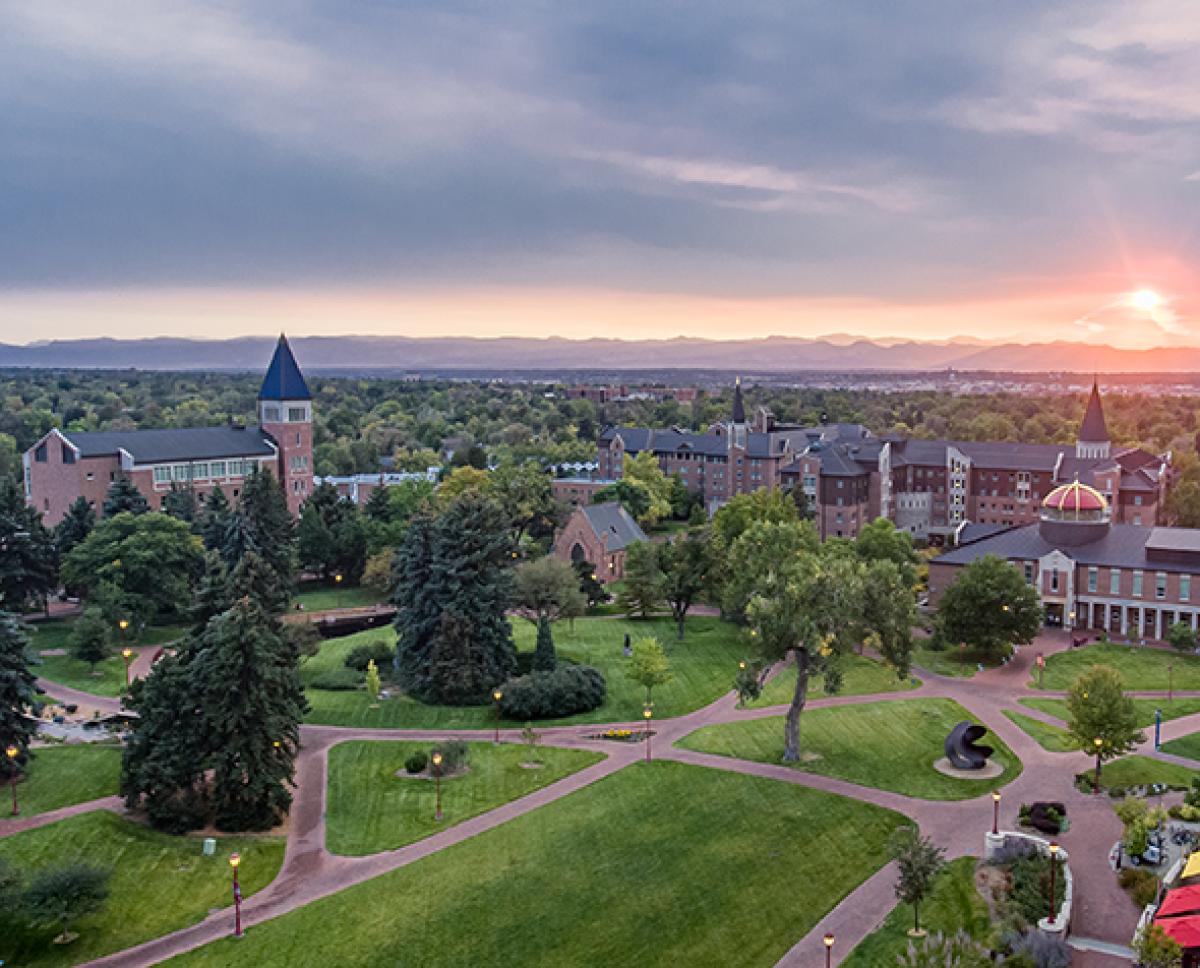 An aerial shot of DU's campus at sunset