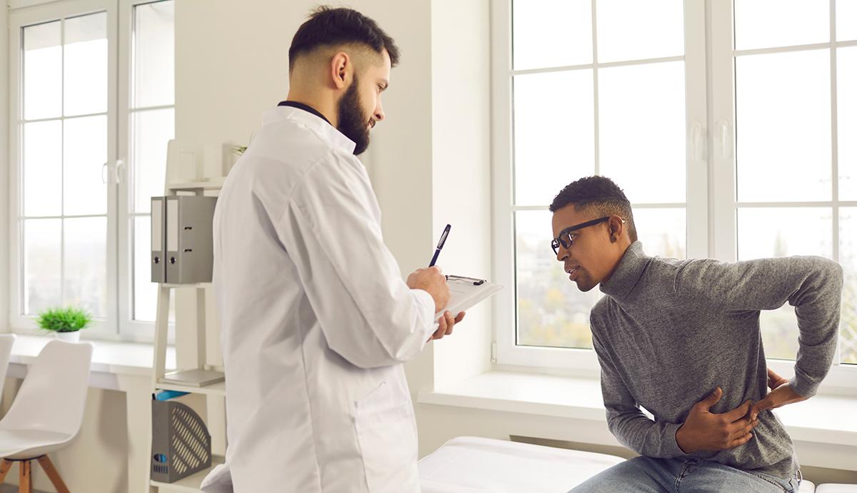 doctor with black male patient