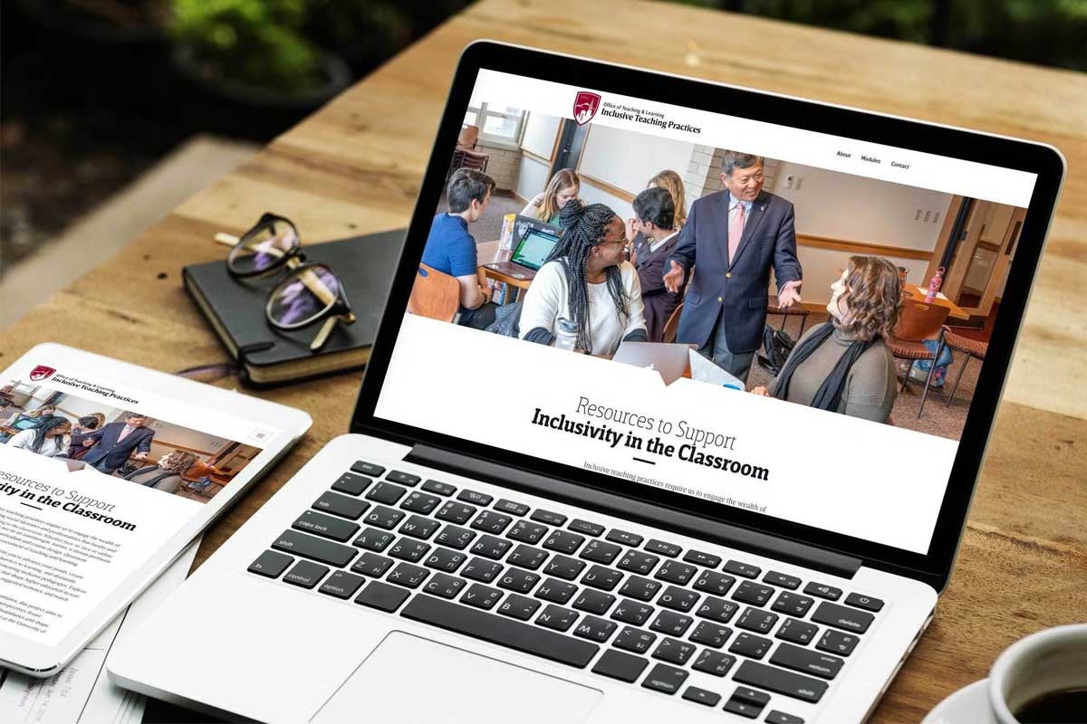 laptop on desk with inclusivity in classroom article on screen
