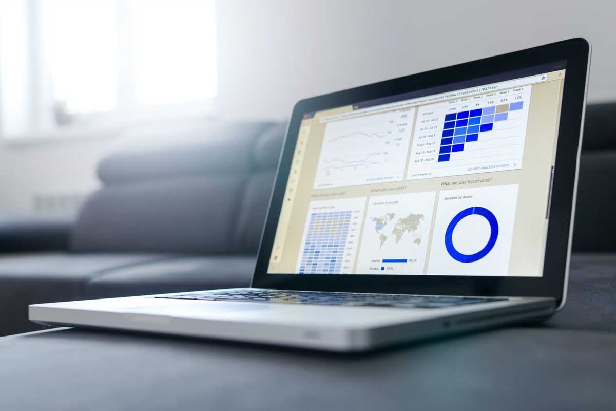 laptop showing charts and graphs