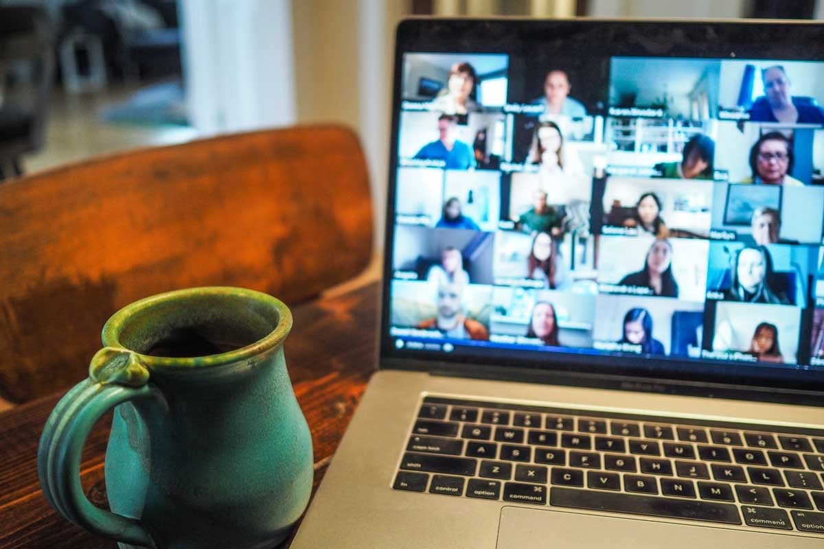 laptop w video chat and mug