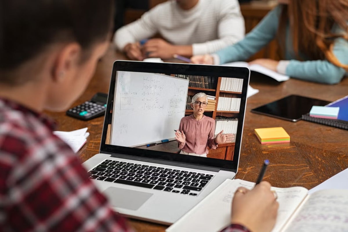 a person watching lecture online