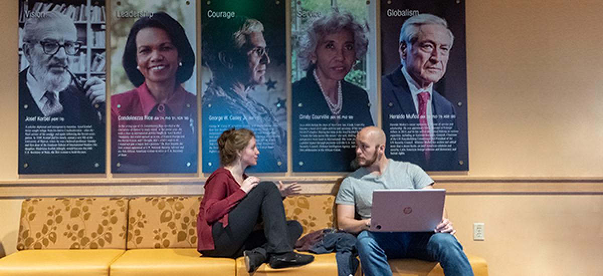students talking in the hallways at the Korbel School