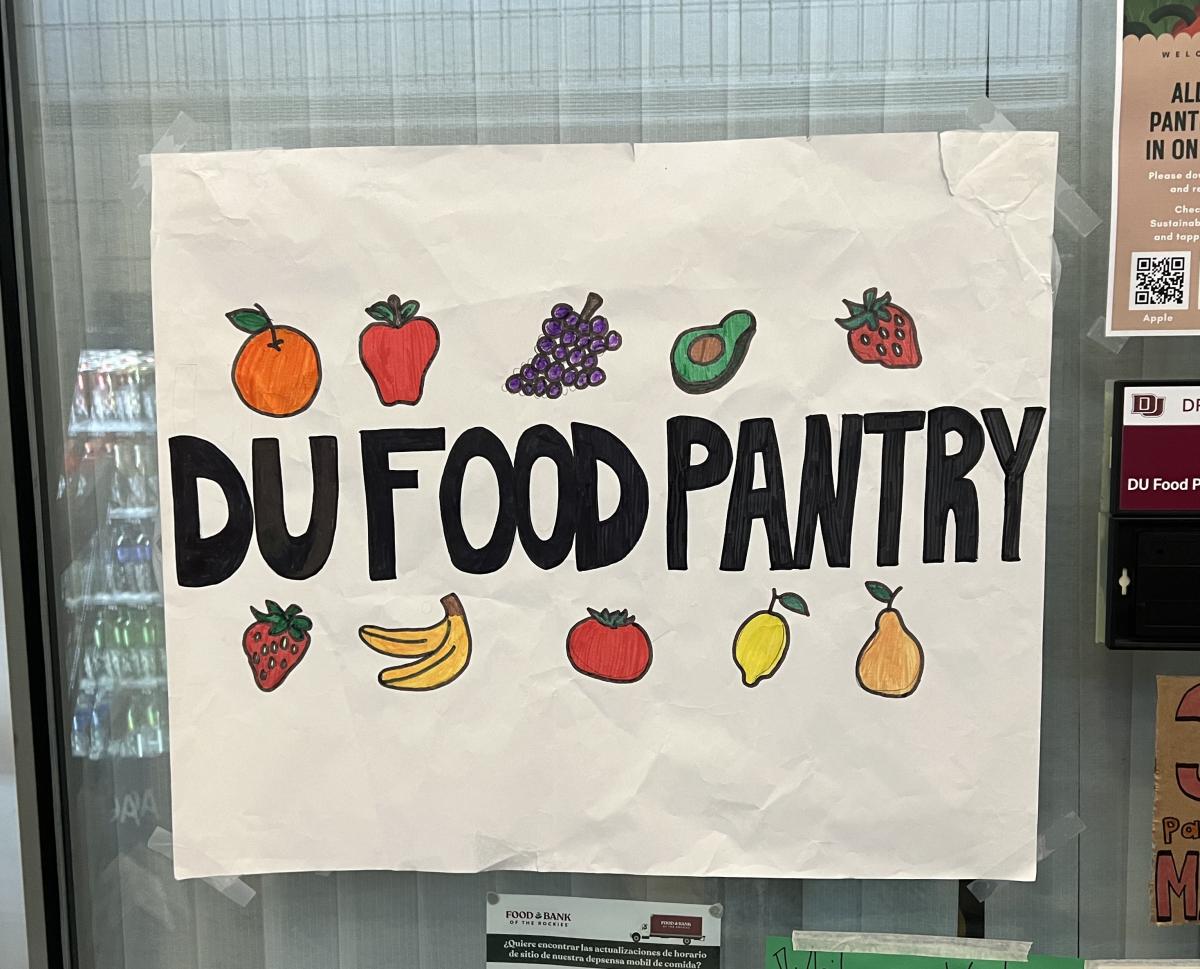 Photo of colorful handmade sign that reads "DU Food Pantry."
