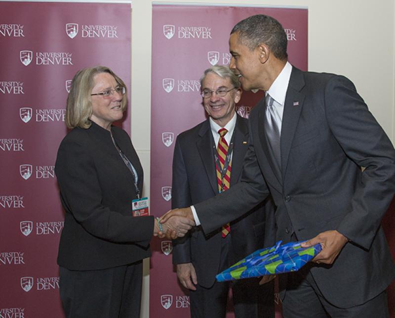 Gilbert shaking hands with Obama