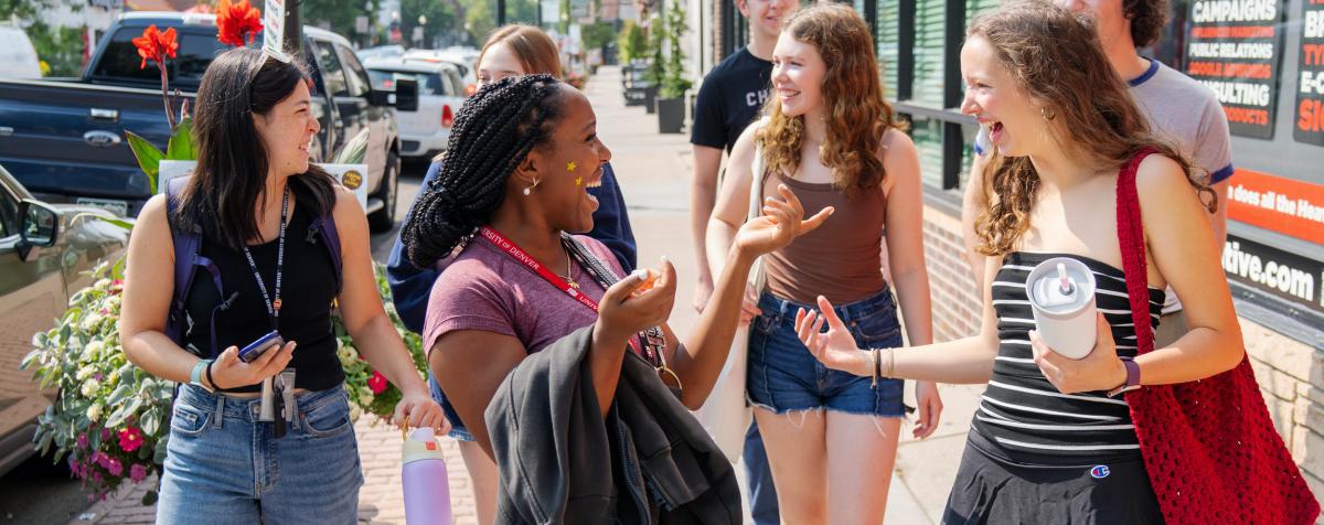 a group of students walking in pearl street