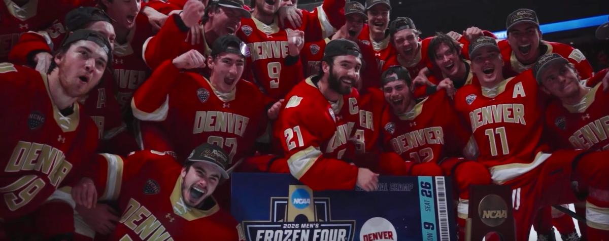 DU hockey team celebrating Frozen 4