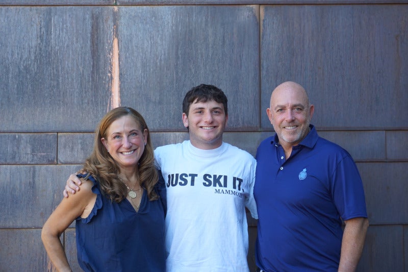 Ben Dade (center) and his parents.