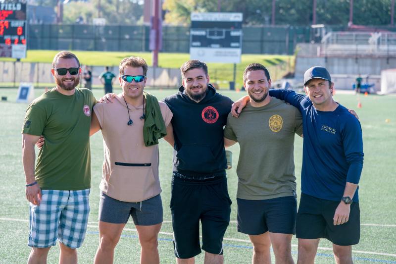 group of men standing outside