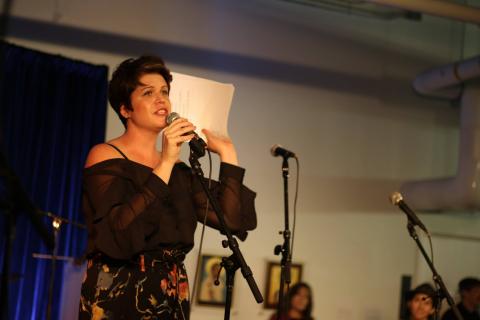 Jami Duffy speaking on stage during Youth on Record's 10-year anniversary