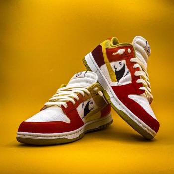 nike shoes with red and yellow paint 