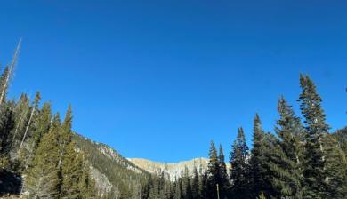picture of a road in the mountains on a sunny clear day
