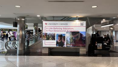 A University of Denver ad in the airport