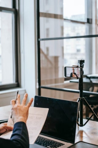 computer and phone recording a course