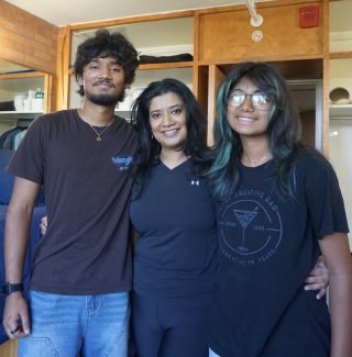 Savit Verma (left) moved in with the help of his mother and sister.