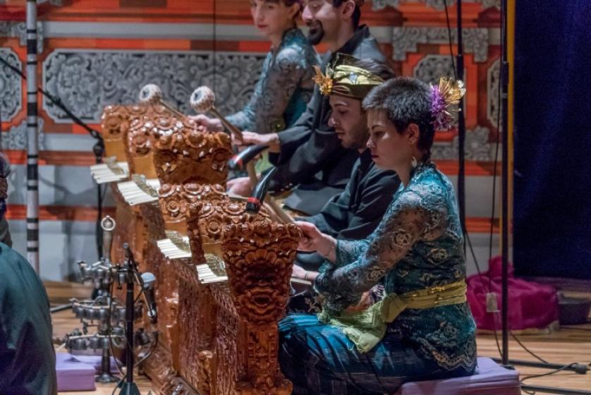 Members of the gamelan orchestra perform