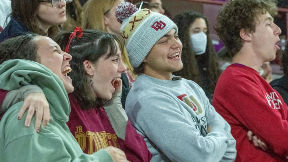 students at Homecoming hockey game