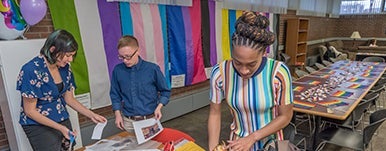students and flags in lounge 